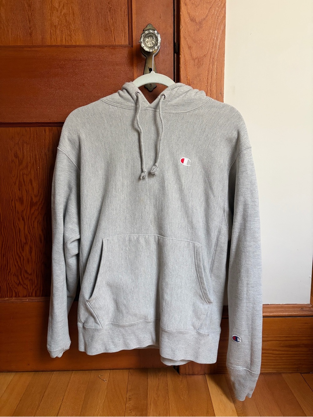 Champion Light Gray Pullover Hoodie with Subtle Logo